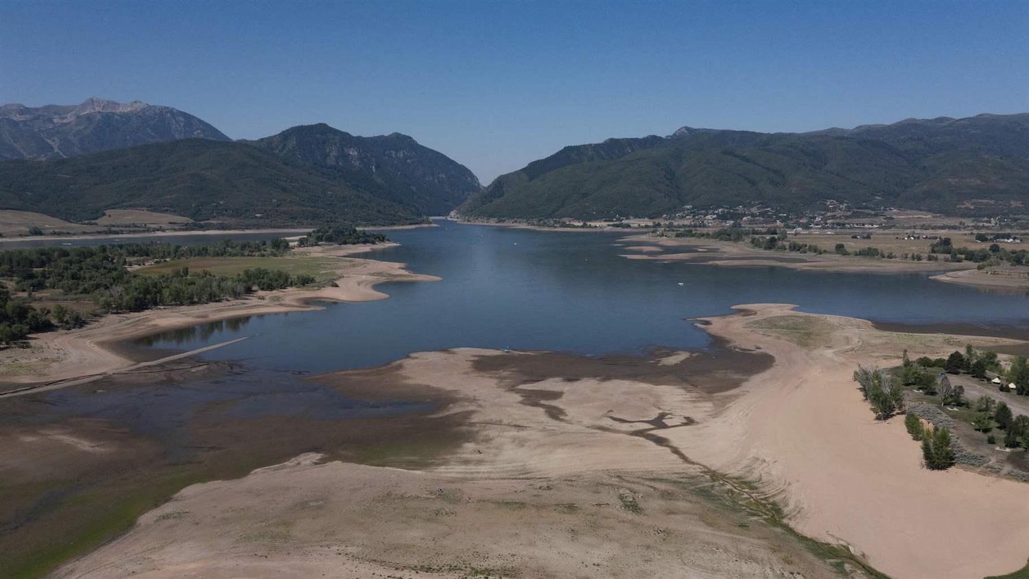 Pineview Reservoir in Utah’s Ogden Valley fell to a quarter full in August. One water district in the valley has blocked new hookups for developers to save its scarce supply for existing users. October 2021